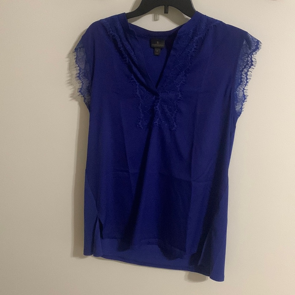 blue v neck shirt